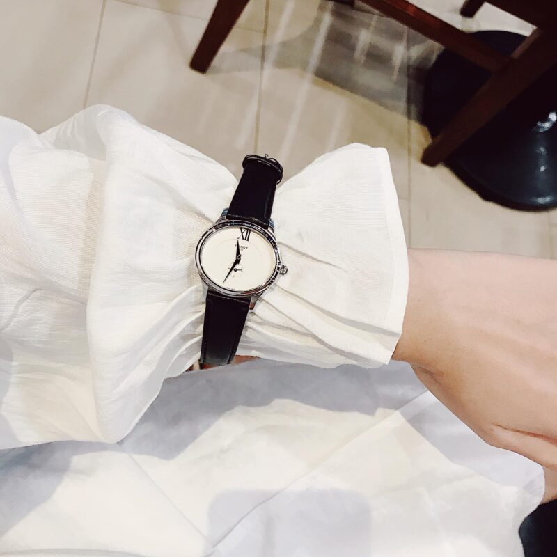 TISSOT T103.310.16.033.00 (mặt trắng, vỏ trắng, dây da đen)